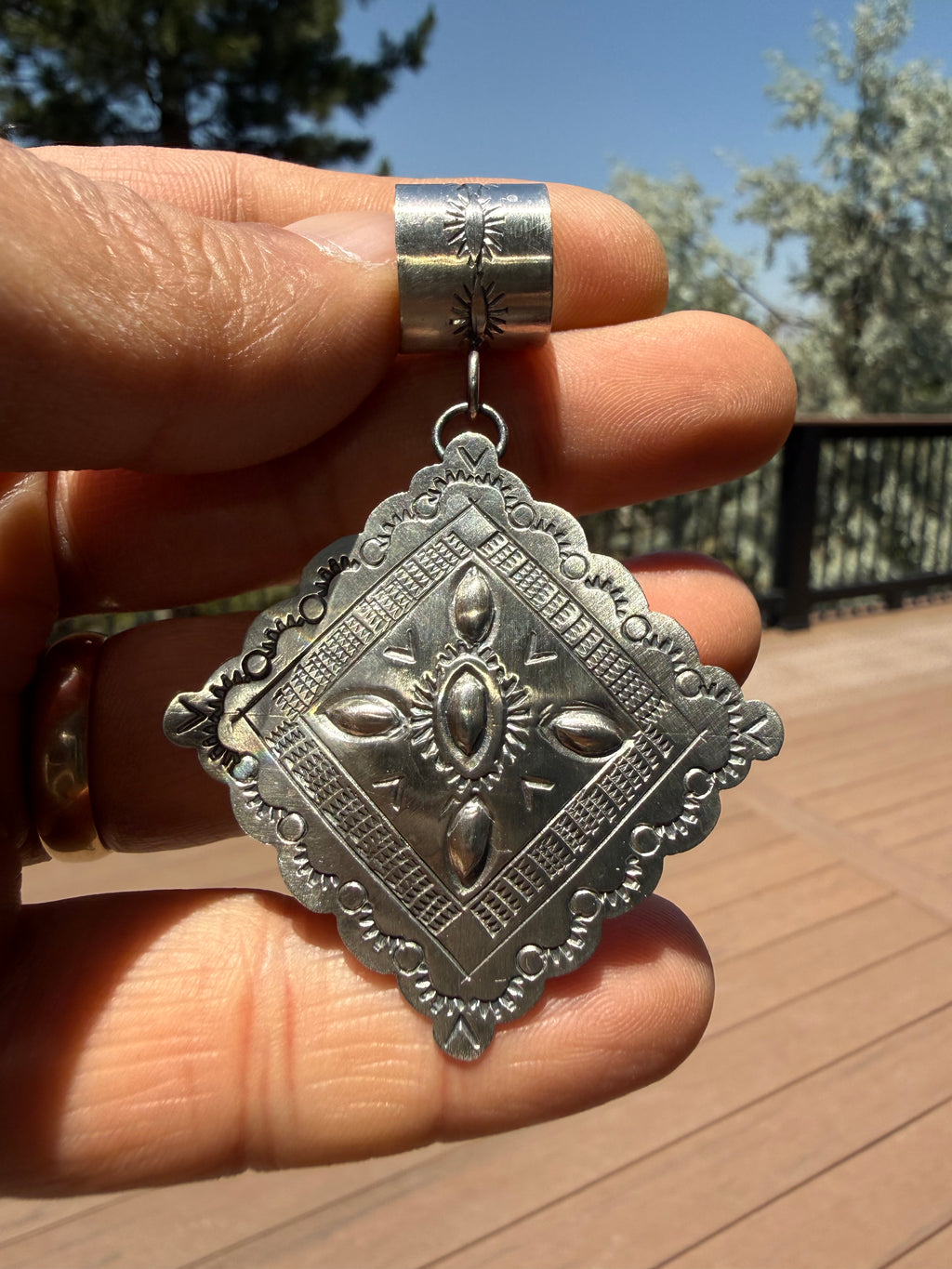 Junior Begay Navajo Hand-stamped Concho Pendant