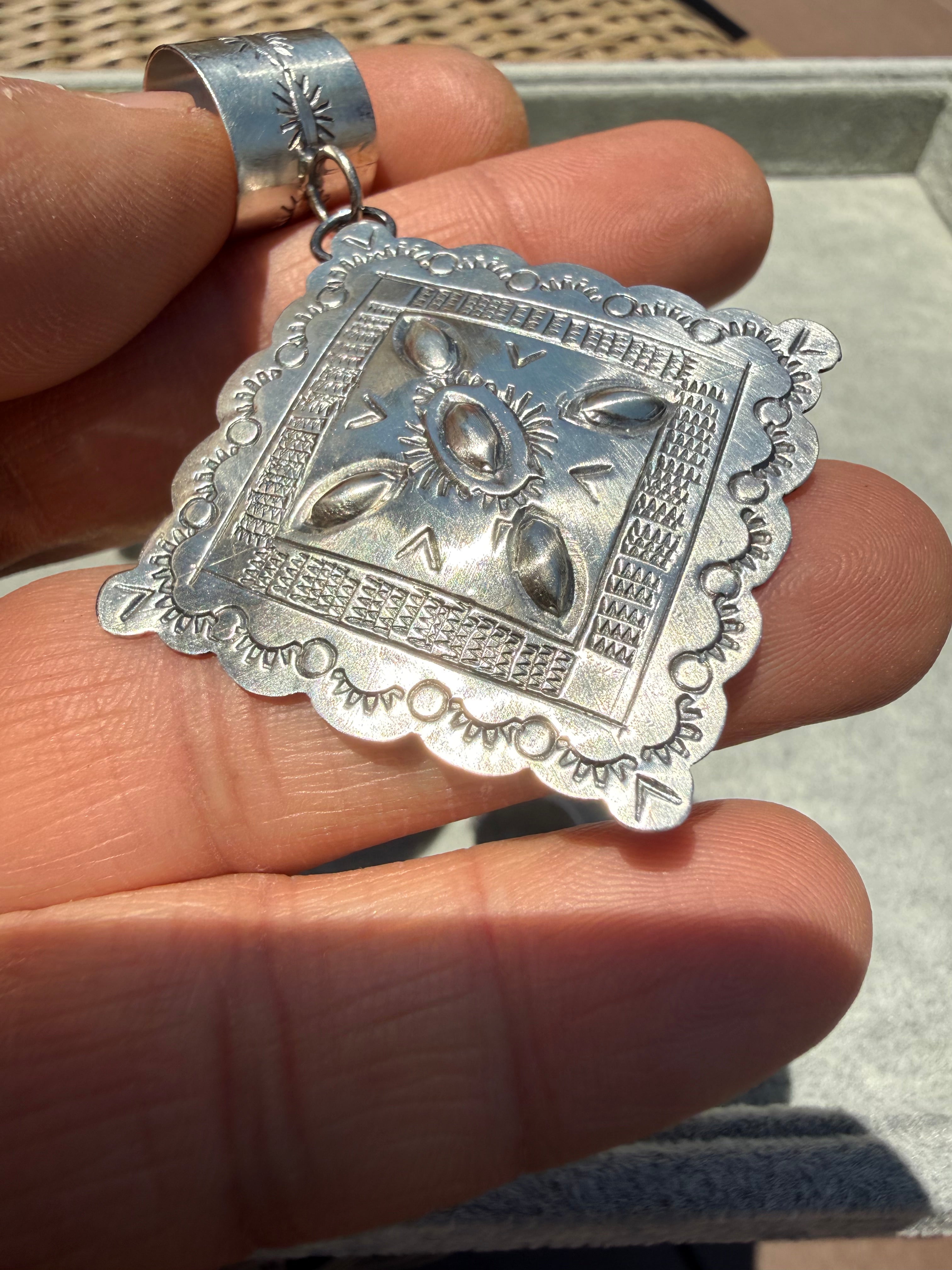 Junior Begay Navajo Hand-stamped Concho Pendant